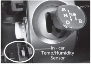 Figure 10: At first glance, the aspirator tube connected to this sensor next to the gear shifter “joystick” makes it look like a conventional in-car temp sensor. But it also has a humidity sensor built into it.